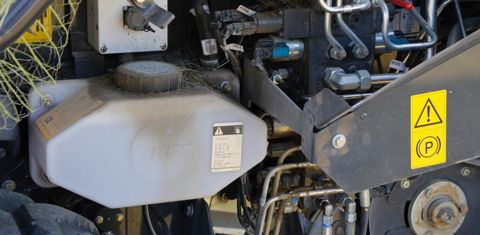 Réservoir de 6,3 litres pour la lubrification automatique de chaîne de la Rollant 540. l.coassin