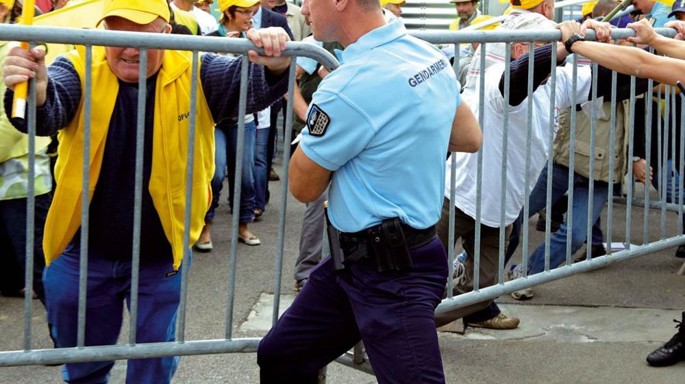 Dans les rangs des manifestants au Space, se trouvaient aussi des producteurs d'Entremont-Alliance venus exprimer leur désarroi.© THIERRY PASQUET