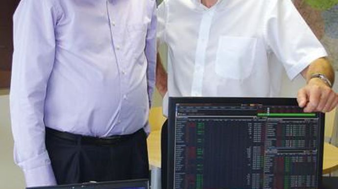 Patrick Salomé, responsable de la mise en marché des céréales (à gauche) et Jean-Pierre Cochet, DG d'Acolyance, prochainement à la retraite. « Ce système nous donne une plus grande visibilité. »C. URVOY