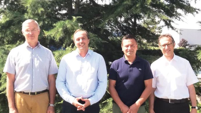 De gauche à droite, Thierry Josserand et Mathieu Staub, président et directeur général de Terre d'Alliances, Jean-Yves Colomb et Georges Boixo, président et DG du groupe Dauphinoise, le 11 juillet à Pusignan (Rhône).