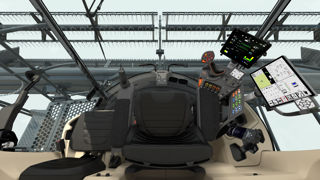 Avec la main gauche occupée à piloter la direction au joystick et la main droite sur le levier JSM2 pour commander l’hydraulique, il n’est plus possible de tenir le volant. Avec la main gauche occupée à piloter la direction au joystick et la main droite sur le levier JSM2 pour commander l’hydraulique, il n’est plus possible de tenir le volant.