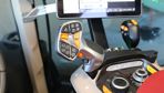 Les séquences Case IH peuvent s'activer depuis la touche dédiée du joystick mais également avec les boutons personnalisables sur le joystick, le levier en croix et le bout de l'accoudoir.