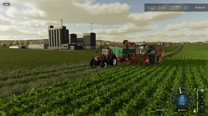 L'automotrice Zkivse à quatre rangs lors d'un chantier de betteraves rouges avec un tracteur Fiat et une remorque Farmtech.