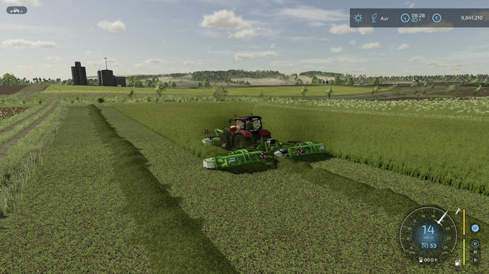 Le tracteur McCormick travaille ici avec un combiné de fauchage d'andainage Samasz.